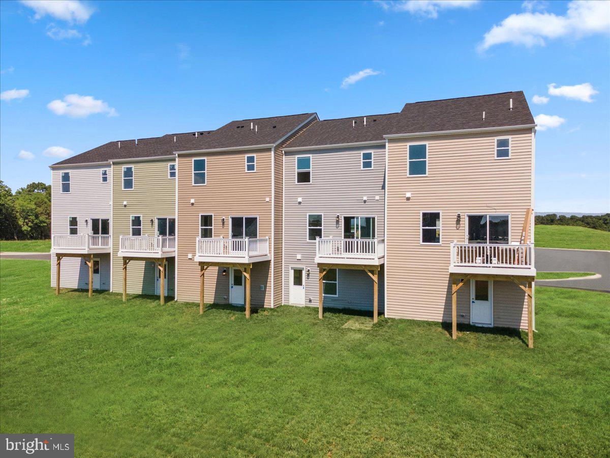 69 Trotting Road Inwood, WV 25428 - Photo 3 of 14 a view of house with a yard