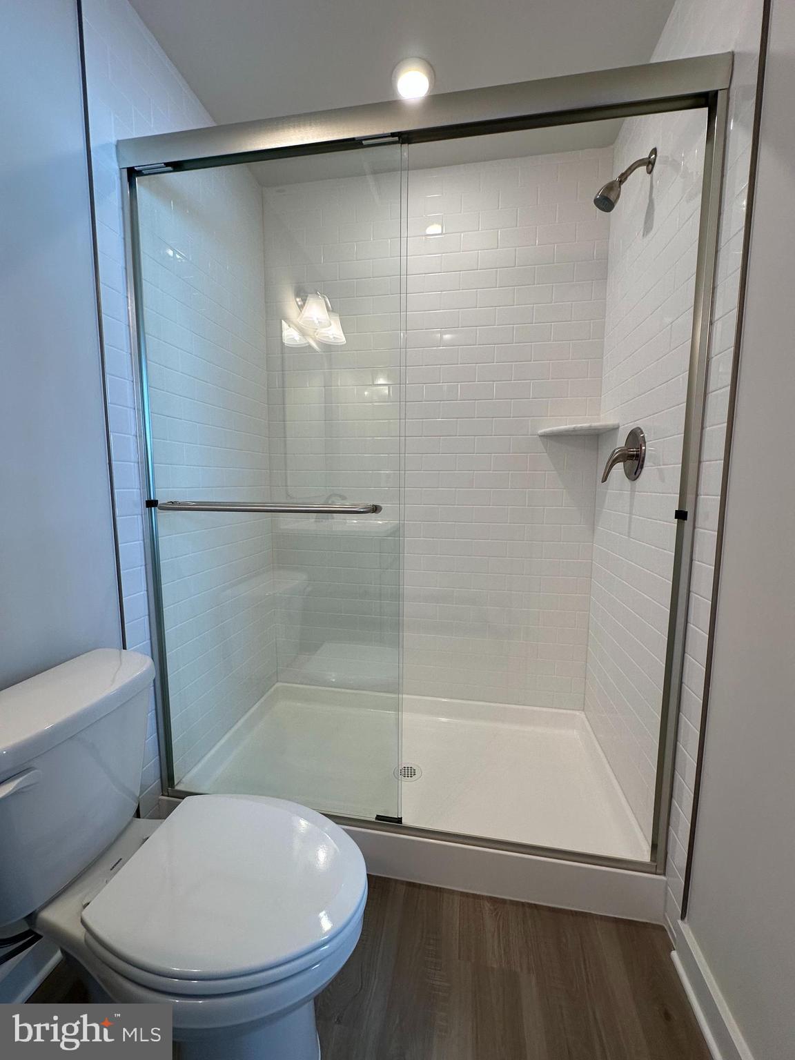 69 Trotting Road Inwood, WV 25428 - Photo 9 of 43 a bathroom with a shower and toilet