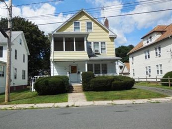 53 Calumet Road Holyoke, MA 01040 - Photo 1 of 12 a front view of a house with a garden and plants