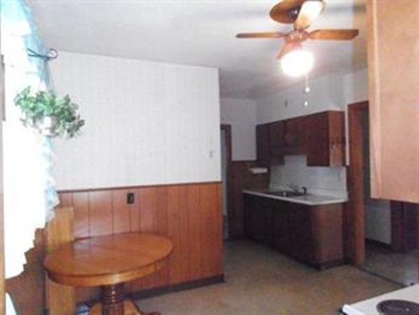 53 Calumet Road Holyoke, MA 01040 - Photo 2 of 12 a kitchen with stainless steel appliances granite countertop a sink a stove and a refrigerator