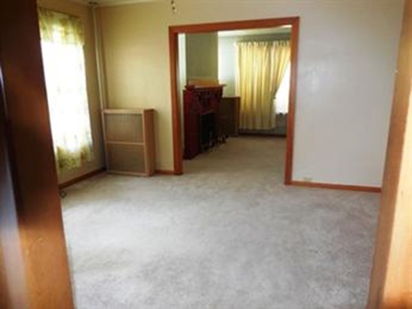53 Calumet Road Holyoke, MA 01040 - Photo 9 of 12 a view of an empty room with a window
