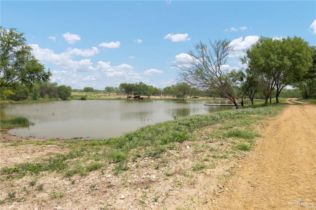 0 Out Of Area Roma, TX 78584 - Photo 19 of 23 a view of a lake with houses in the back