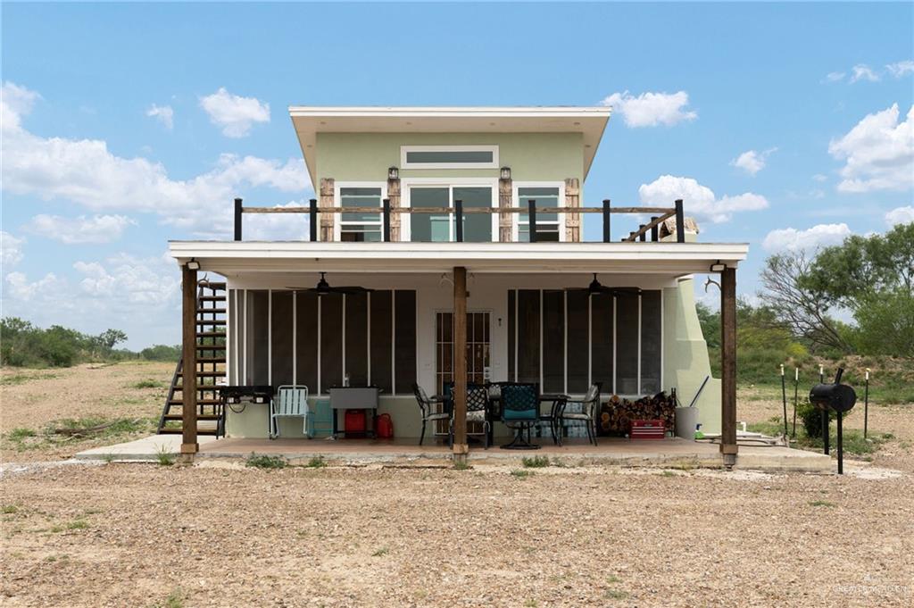 0 Out Of Area Roma, TX 78584 - Photo 4 of 23 a front view of a house with a porch