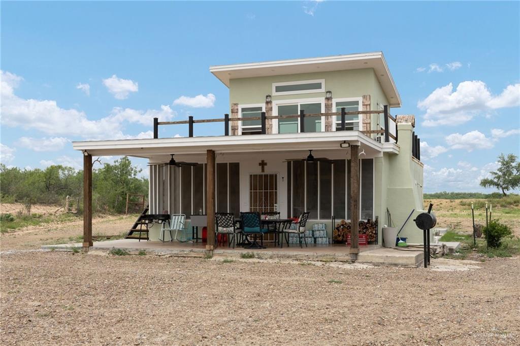 0 Out Of Area Roma, TX 78584 - Photo 5 of 23 a front view of a house with a yard