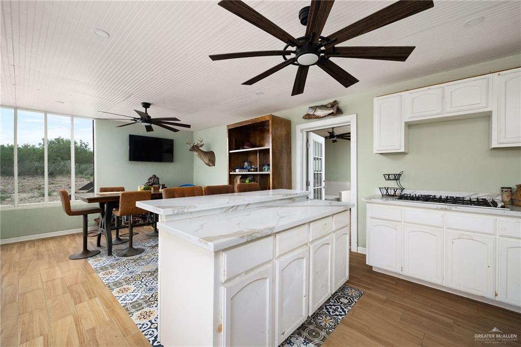 0 Out Of Area Roma, TX 78584 - Photo 9 of 23 a open kitchen with stainless steel appliances granite countertop a stove and a refrigerator