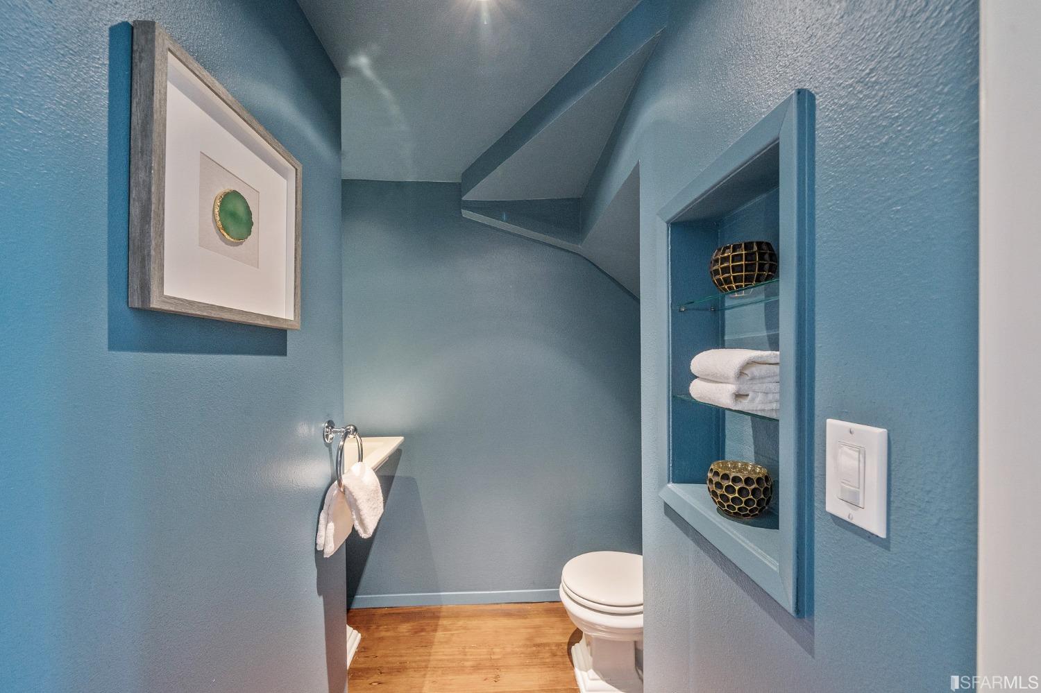 104 3rd Avenue San Francisco, CA 94118 - Photo 15 of 41 a bathroom with a toilet and a sink