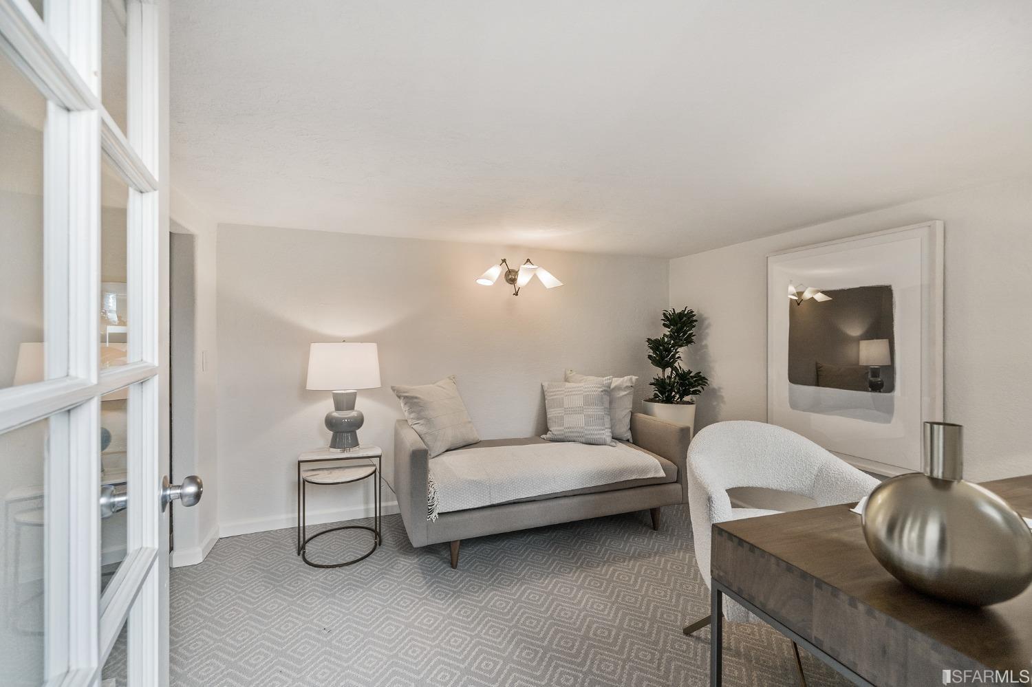 104 3rd Avenue San Francisco, CA 94118 - Photo 30 of 41 a living room with furniture and a flat screen tv