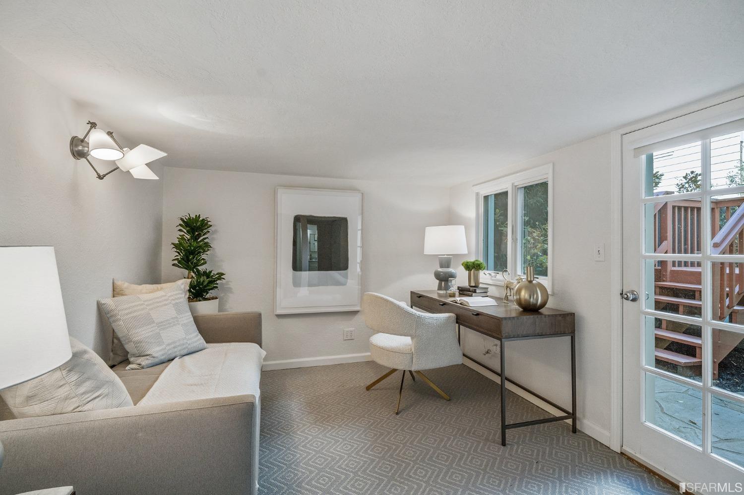 104 3rd Avenue San Francisco, CA 94118 - Photo 31 of 41 a living room with furniture a lamp and a potted plant