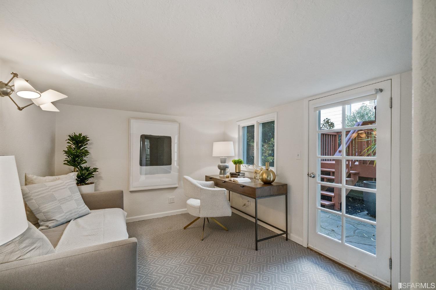 104 3rd Avenue San Francisco, CA 94118 - Photo 33 of 41 a living room with furniture a rug and a window
