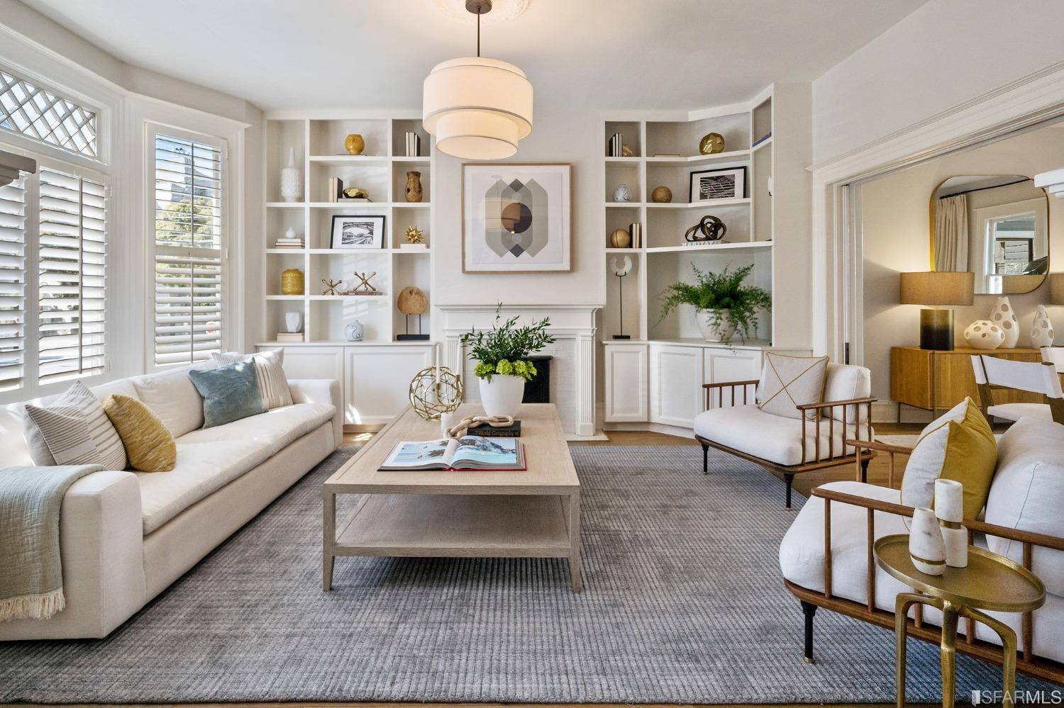 104 3rd Avenue San Francisco, CA 94118 - Photo 5 of 41 a living room with furniture a chandelier and a chandelier