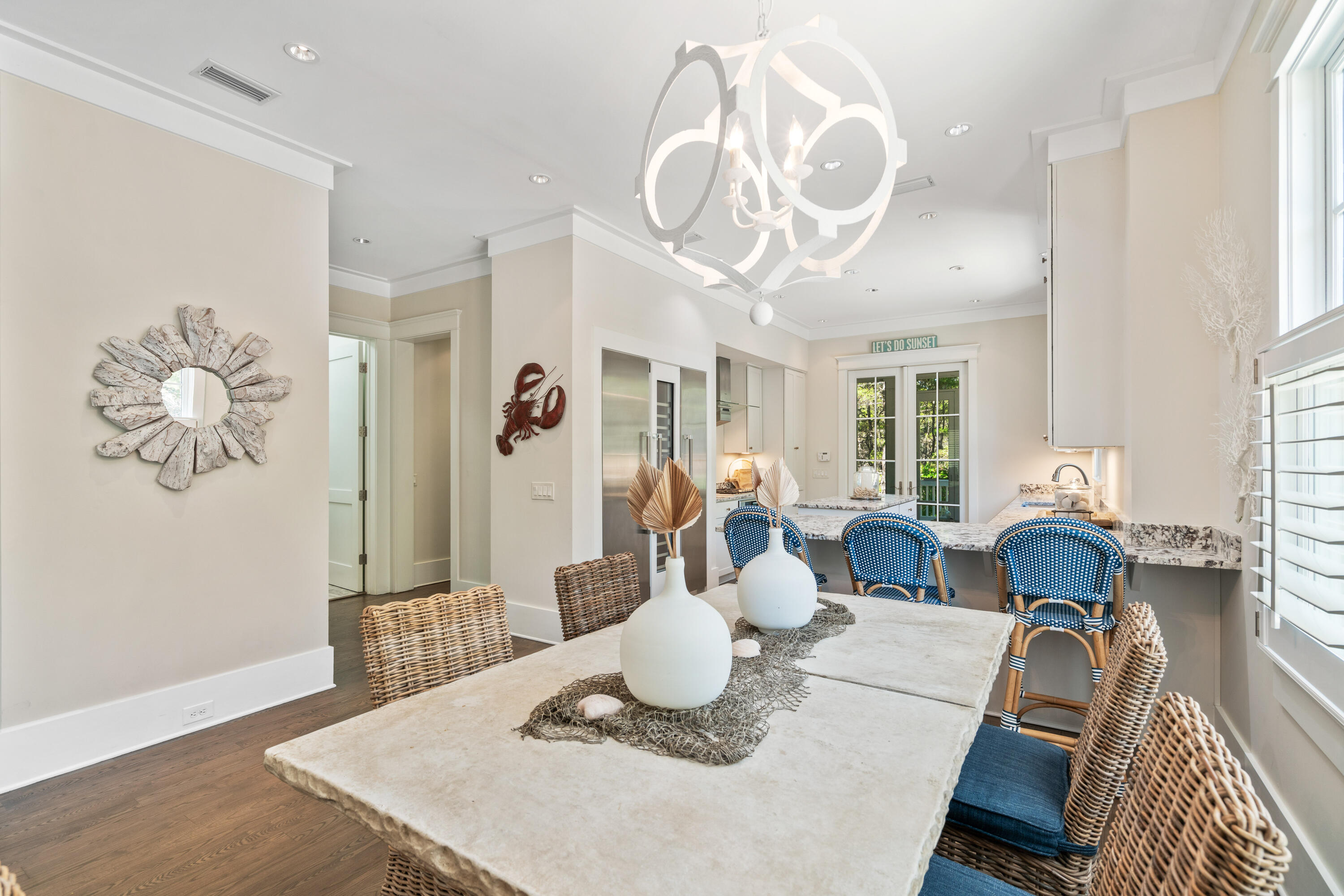 10 Coopersmith Lane Inlet Beach, FL 32461 - Photo 17 of 69 a living room with furniture a chandelier and a dining table