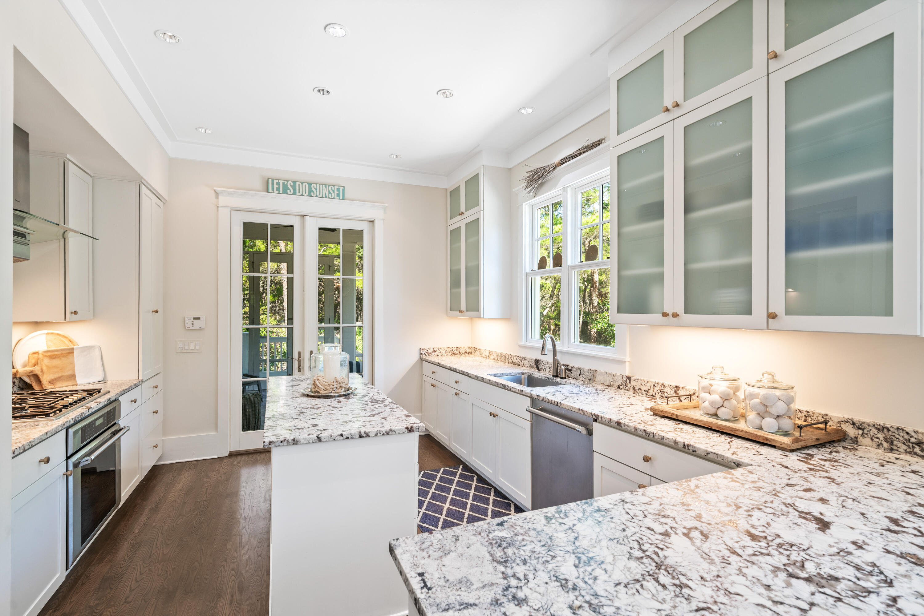 10 Coopersmith Lane Inlet Beach, FL 32461 - Photo 19 of 69 a kitchen with stainless steel appliances granite countertop a stove and a sink