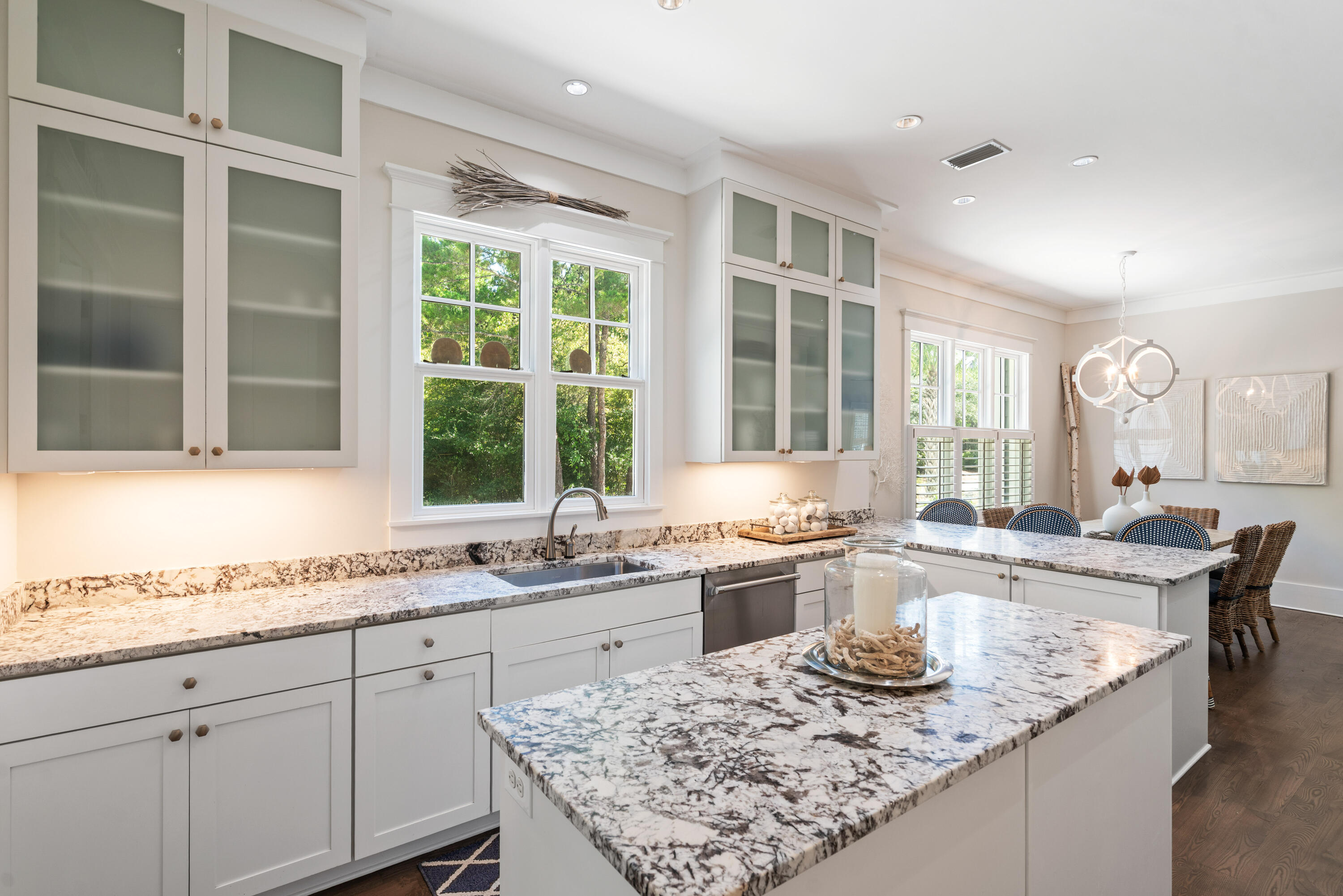 10 Coopersmith Lane Inlet Beach, FL 32461 - Photo 22 of 69 a kitchen with granite countertop sink stove and cabinets