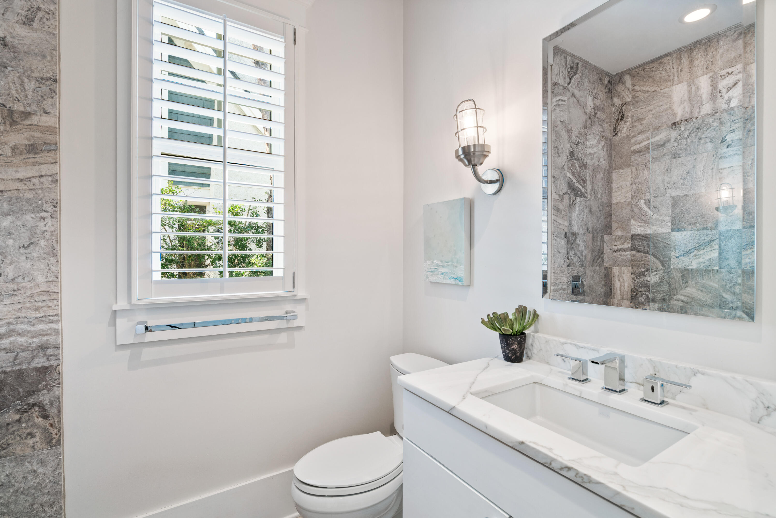 10 Coopersmith Lane Inlet Beach, FL 32461 - Photo 30 of 69 a bathroom with a granite countertop sink a toilet and a mirror