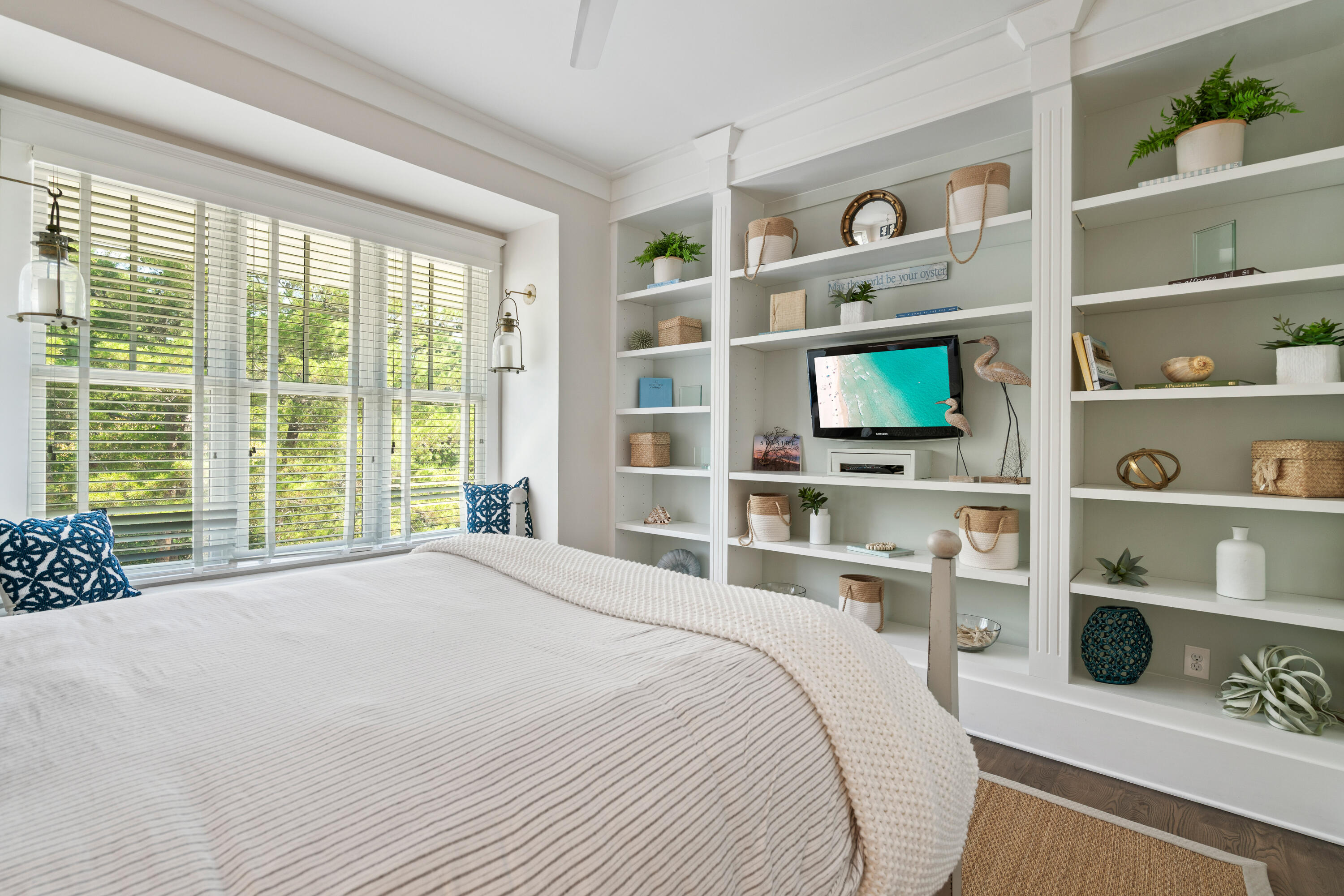 10 Coopersmith Lane Inlet Beach, FL 32461 - Photo 44 of 69 a bedroom with a bed a table and a large window