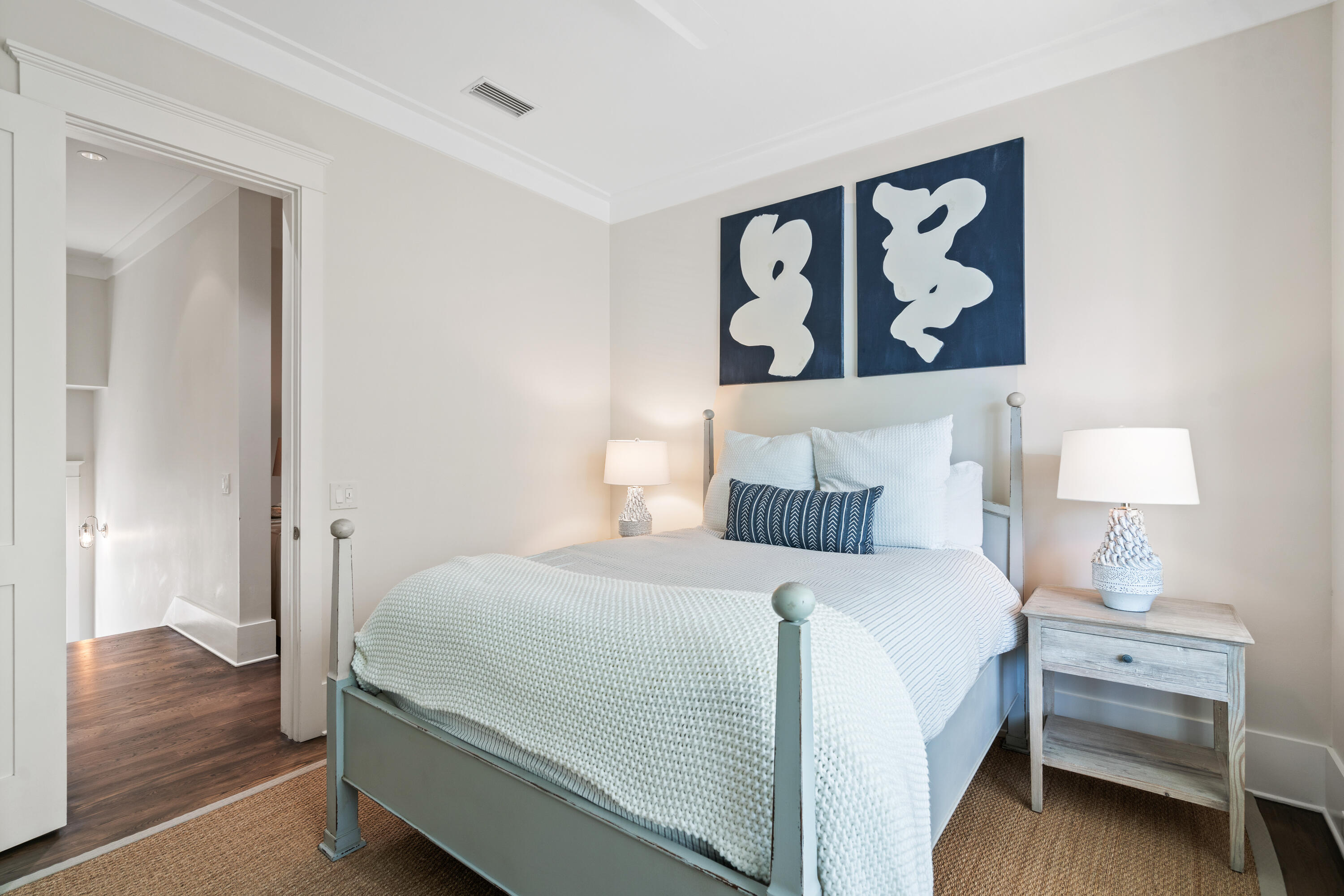 10 Coopersmith Lane Inlet Beach, FL 32461 - Photo 45 of 69 a bedroom with a bed and a lamp on table