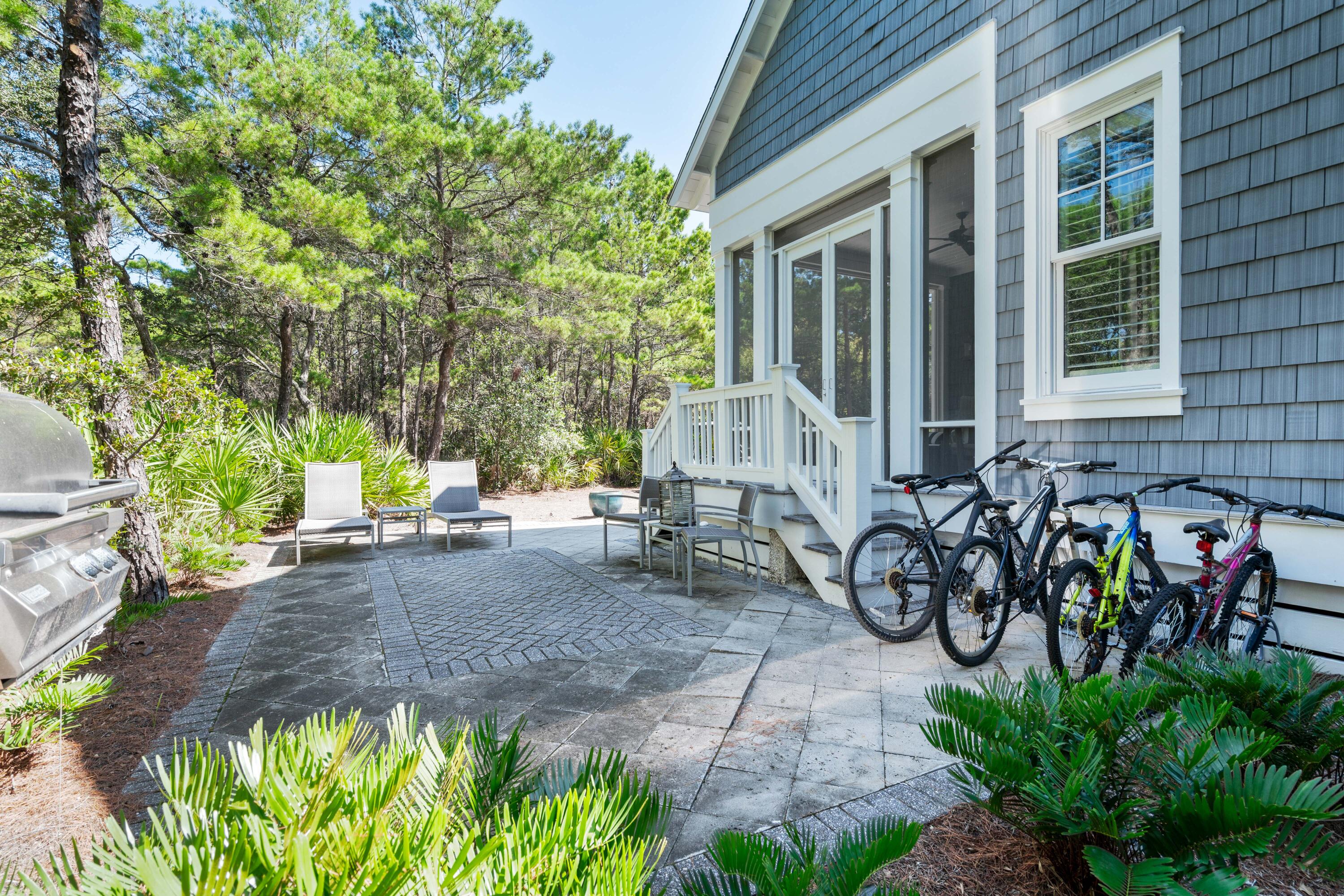 10 Coopersmith Lane Inlet Beach, FL 32461 - Photo 55 of 69 a couple of bicycles parked in front of house