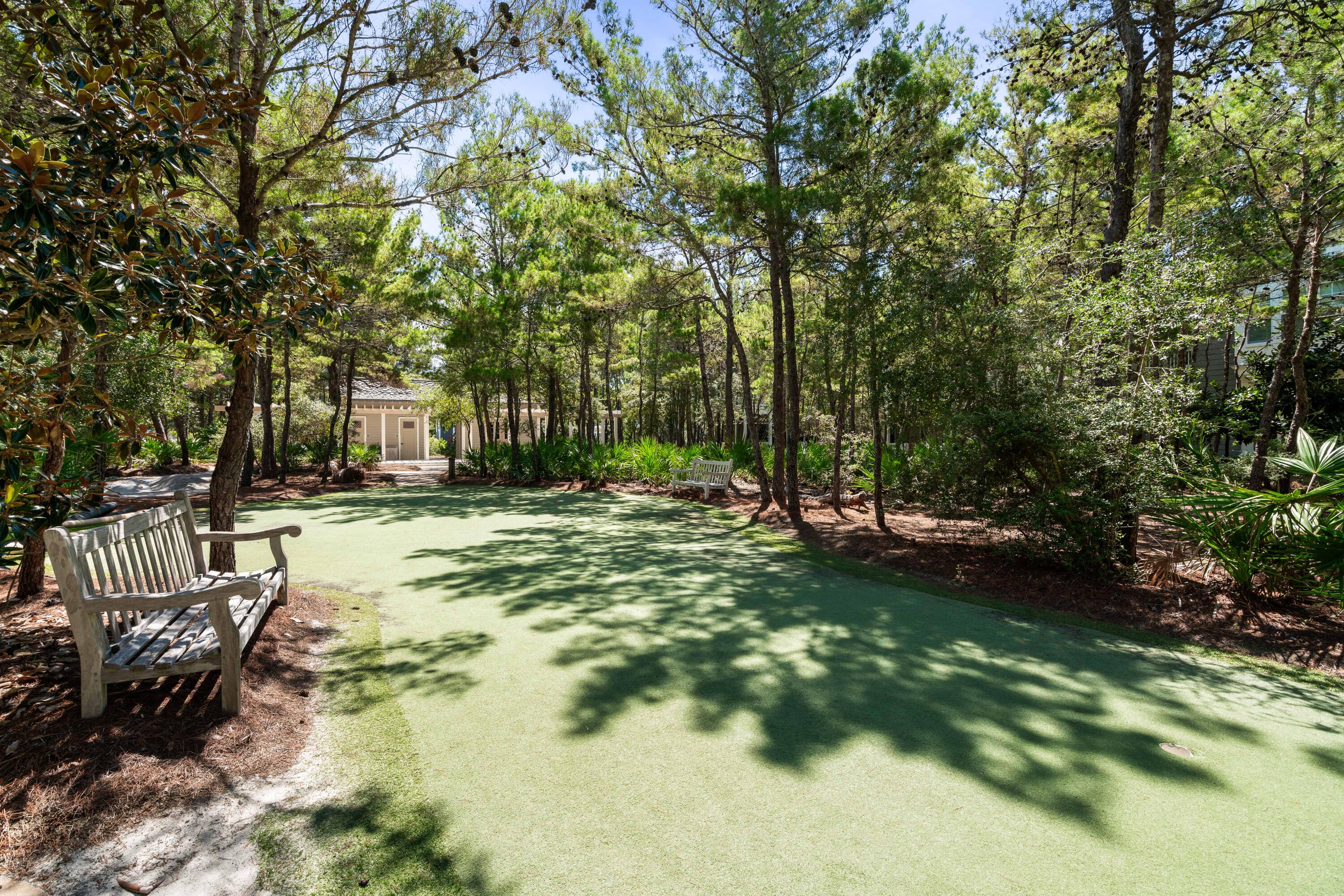 10 Coopersmith Lane Inlet Beach, FL 32461 - Photo 57 of 69 a view of a garden with a bench
