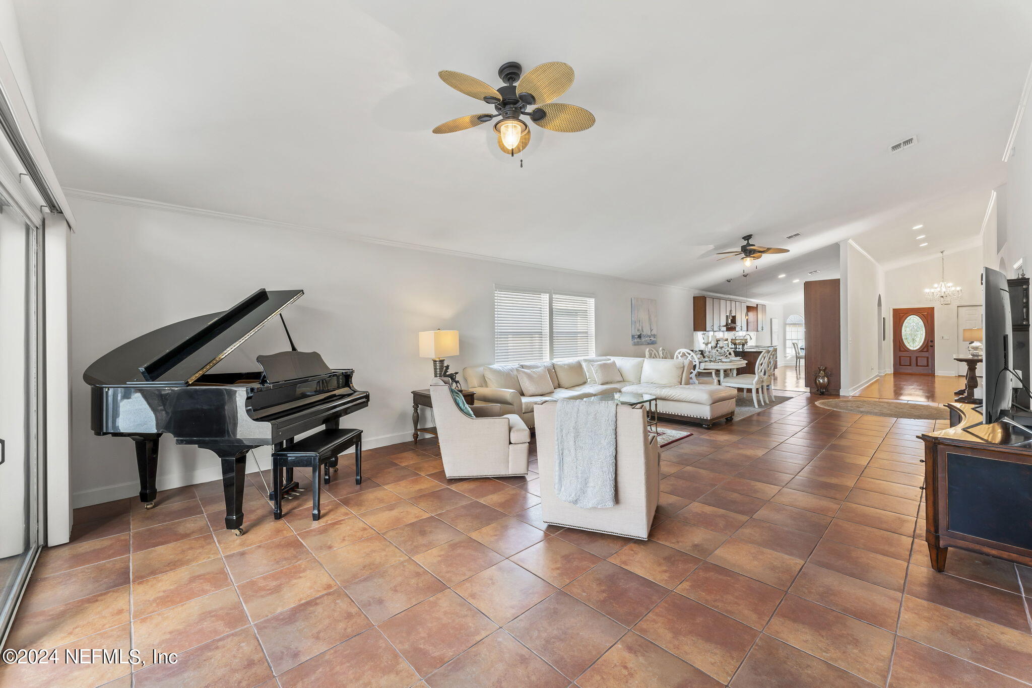 256 Patrick Mill Circle Ponte Vedra Beach, FL 32082 - Photo 20 of 69 a living room with furniture a rug and a chandelier