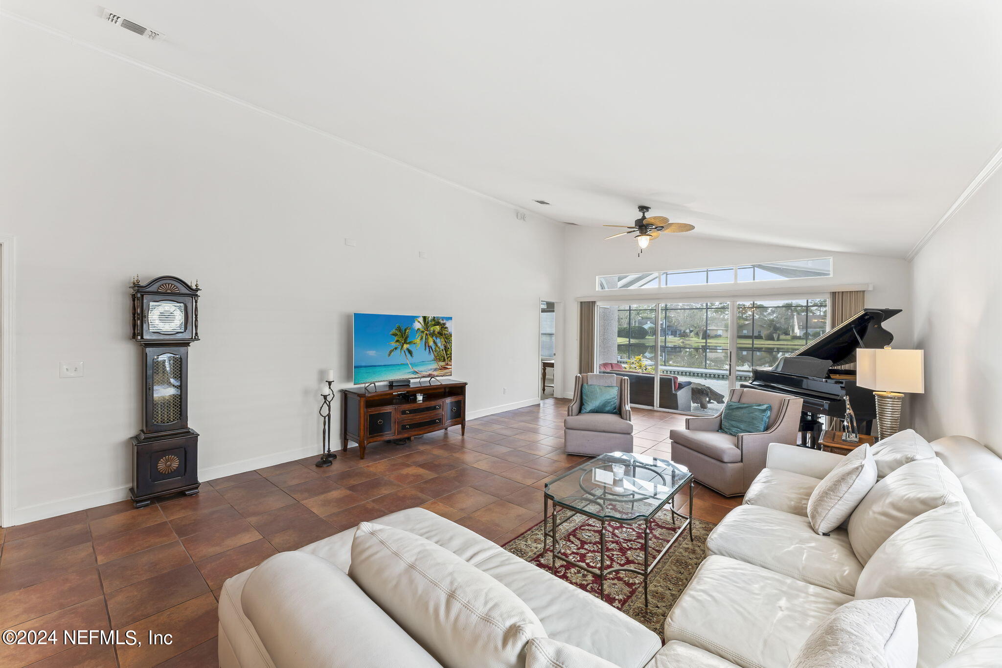 256 Patrick Mill Circle Ponte Vedra Beach, FL 32082 - Photo 21 of 69 a living room with furniture and a flat screen tv