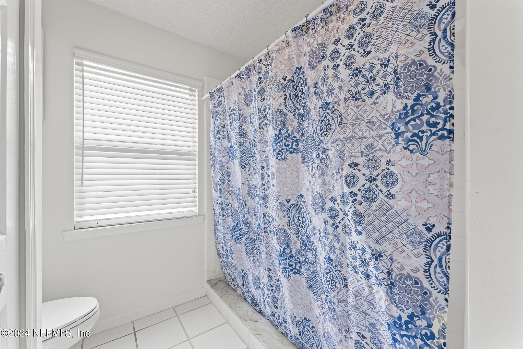 256 Patrick Mill Circle Ponte Vedra Beach, FL 32082 - Photo 26 of 69 a bathroom with a toilet and a window
