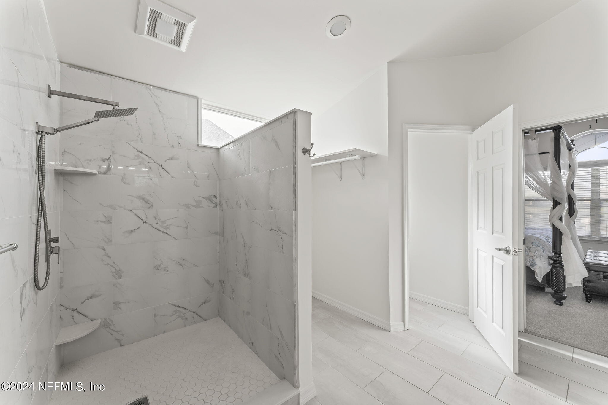 256 Patrick Mill Circle Ponte Vedra Beach, FL 32082 - Photo 35 of 69 a bathroom with a shower and a glass door