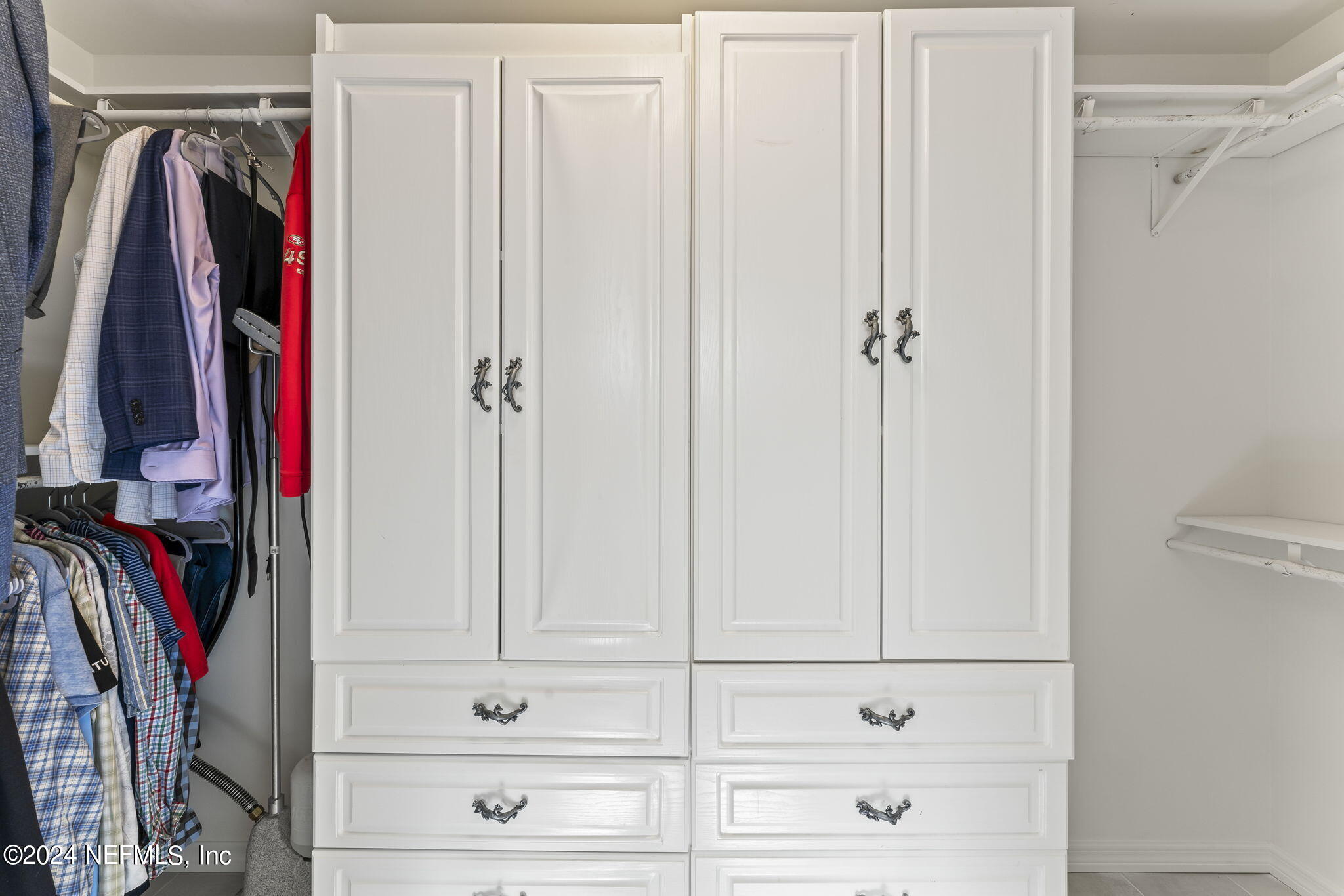 256 Patrick Mill Circle Ponte Vedra Beach, FL 32082 - Photo 36 of 69 a view of walk in closet with clothes