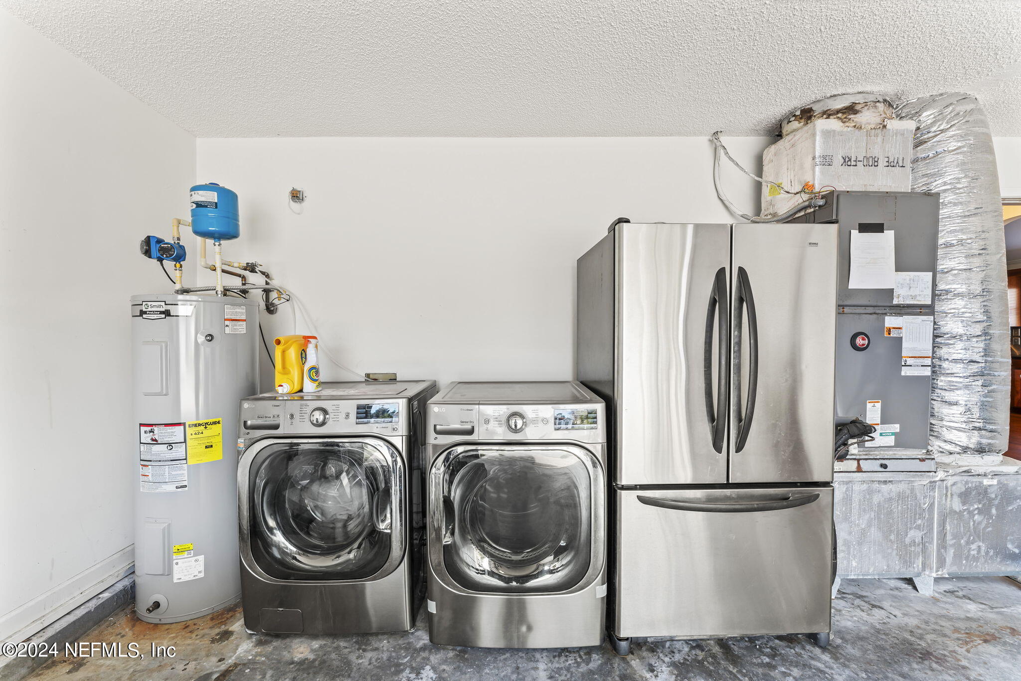 256 Patrick Mill Circle Ponte Vedra Beach, FL 32082 - Photo 40 of 69 a utility room with dryer and washer