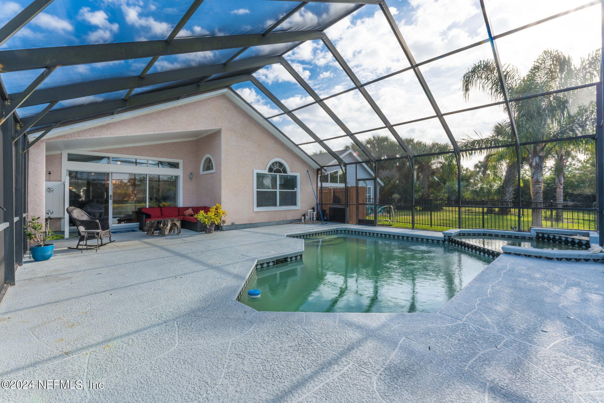 256 Patrick Mill Circle Ponte Vedra Beach, FL 32082 - Photo 46 of 69 a view of a swimming pool with a patio