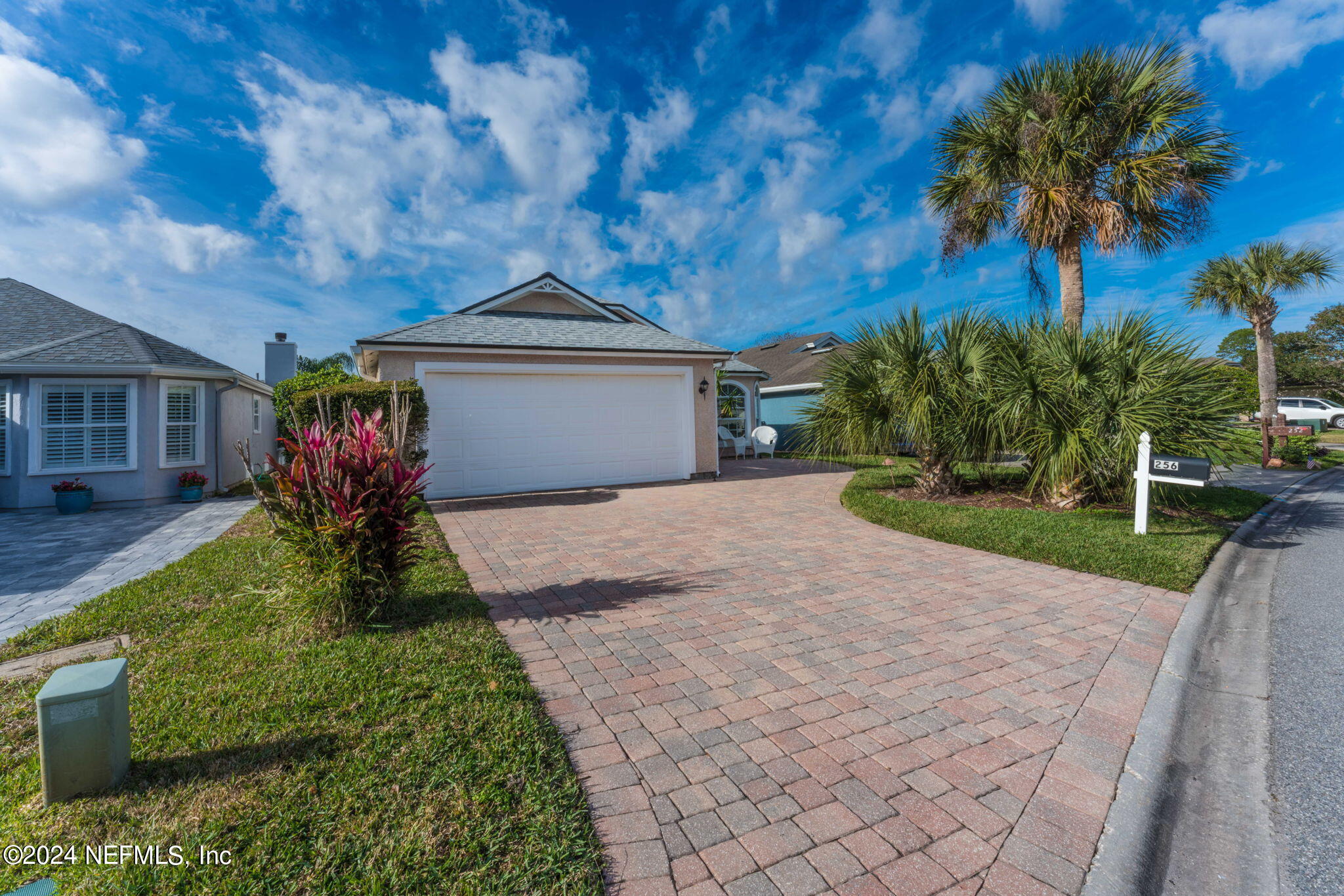 256 Patrick Mill Circle Ponte Vedra Beach, FL 32082 - Photo 54 of 69 a front view of a house with garden