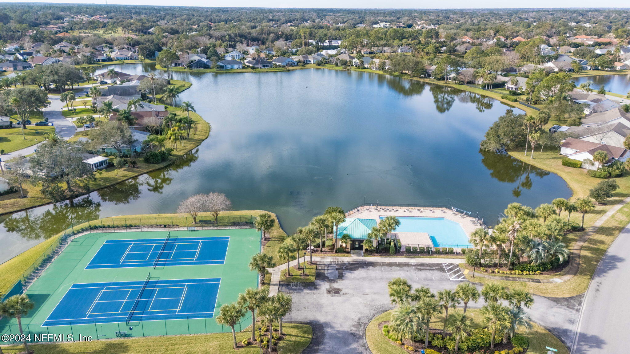 256 Patrick Mill Circle Ponte Vedra Beach, FL 32082 - Photo 68 of 69 an aerial view of residential houses with outdoor space and lake view