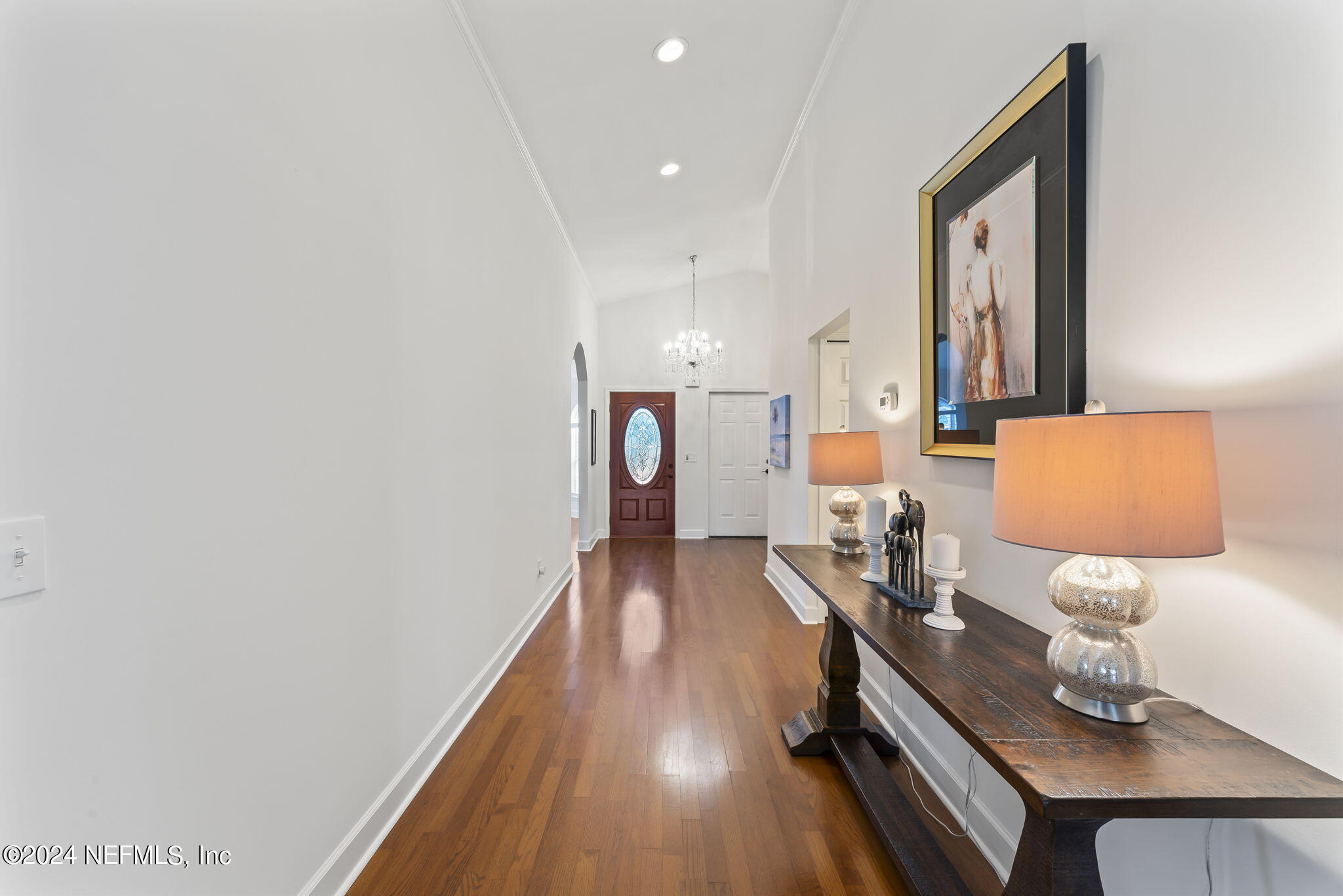 256 Patrick Mill Circle Ponte Vedra Beach, FL 32082 - Photo 7 of 69 a hallway with furniture and wooden floor