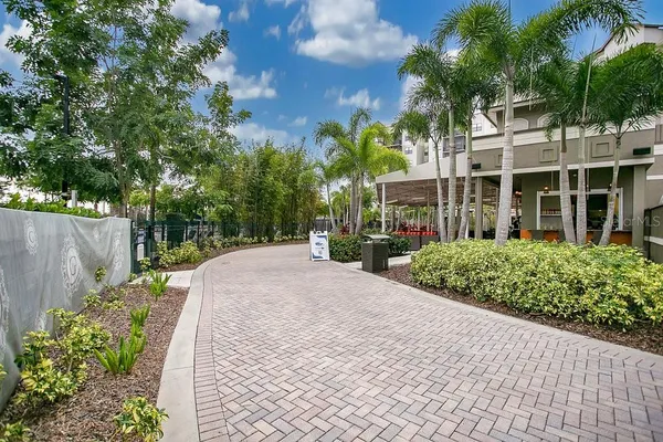 a view of a building with a yard