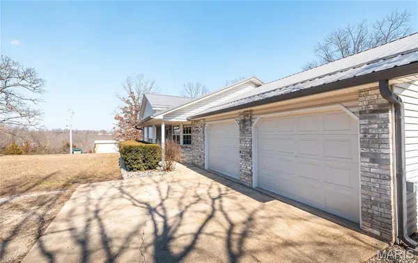 $350,000 | 14395 Torpedo Drive, St. Robert, MO 65584