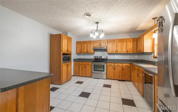 $350,000 | 14395 Torpedo Drive, St. Robert, MO 65584