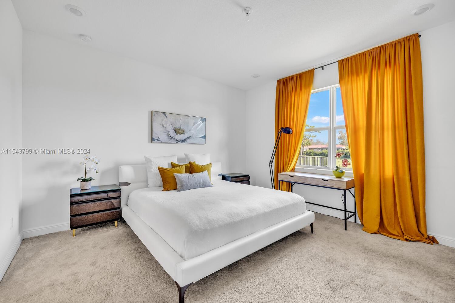 4242 Rosa Drive, Unit 4242 Deerfield Beach, FL 33064 - Photo 17 of 32 a bedroom with a bed and a window