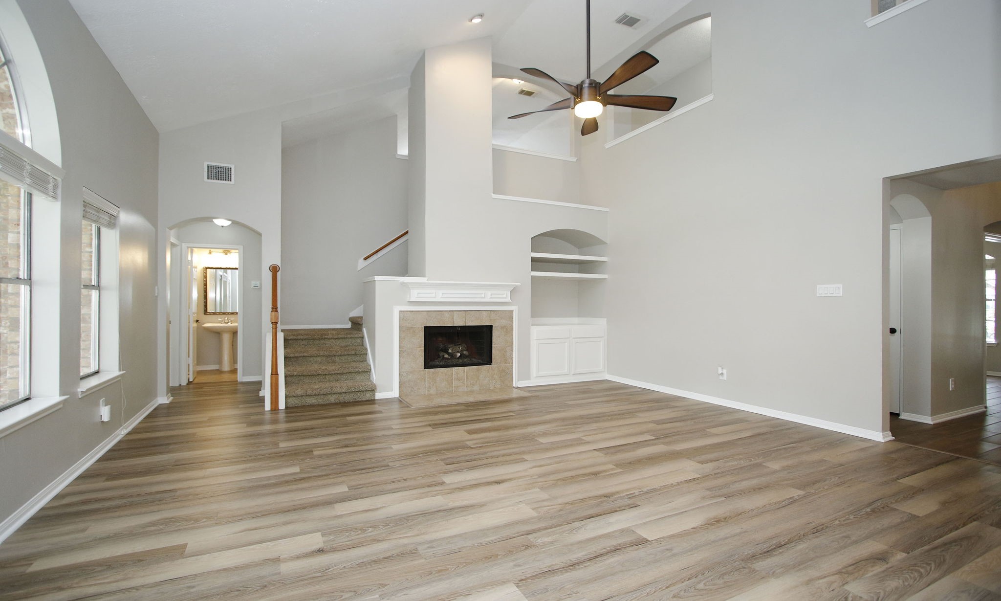 1915 West Welsford Drive Spring, TX 77386 - Photo 15 of 48 a view of empty room with wooden floor and fan