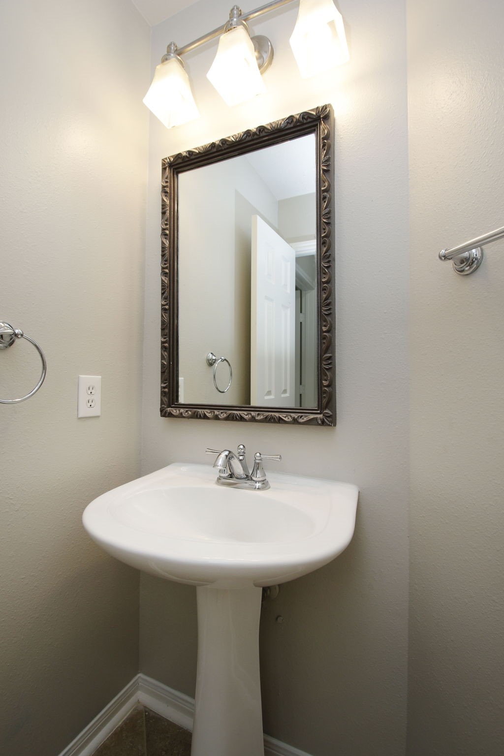 1915 West Welsford Drive Spring, TX 77386 - Photo 24 of 48 a bathroom with a sink and a mirror