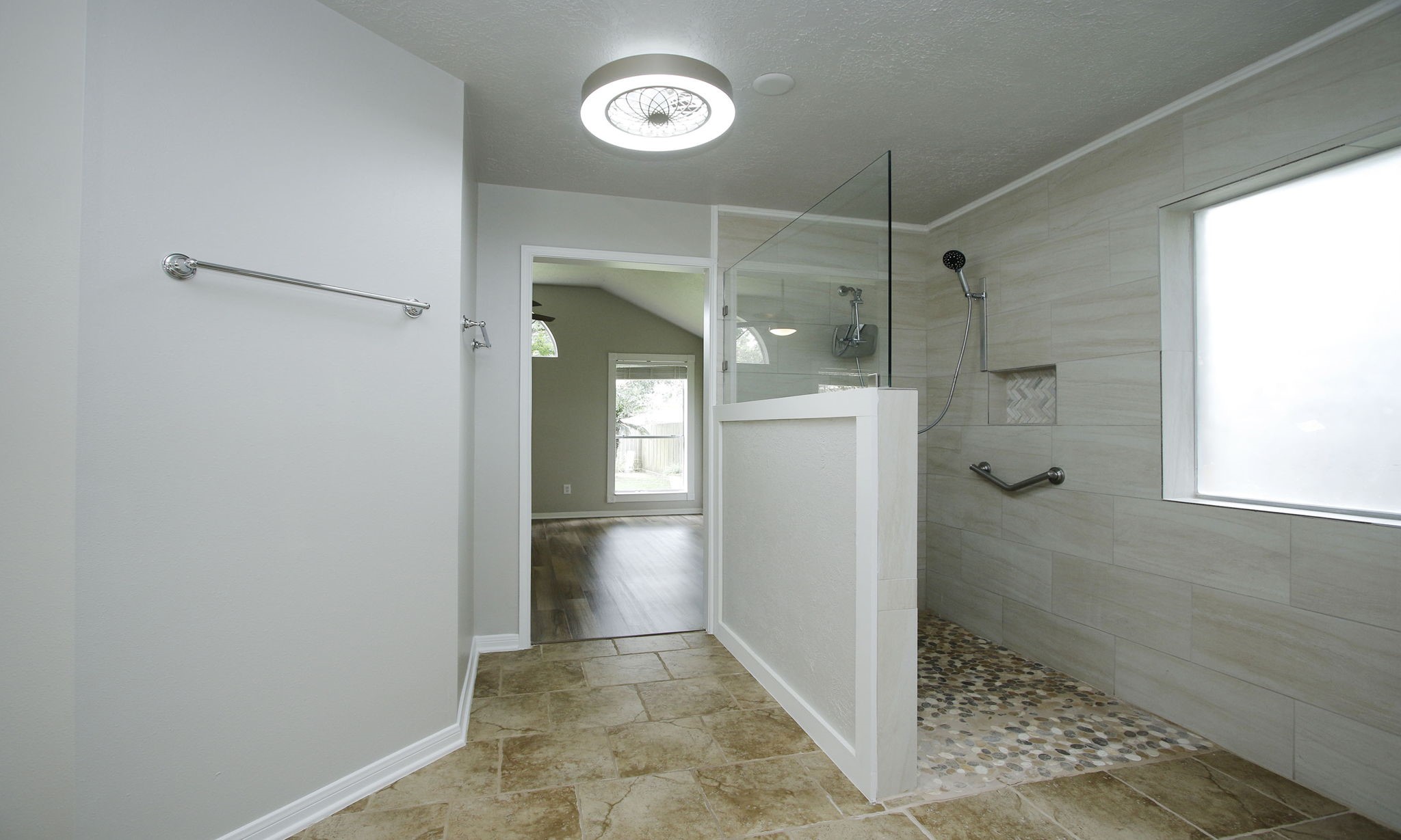 1915 West Welsford Drive Spring, TX 77386 - Photo 28 of 48 a bathroom with a shower and a sink