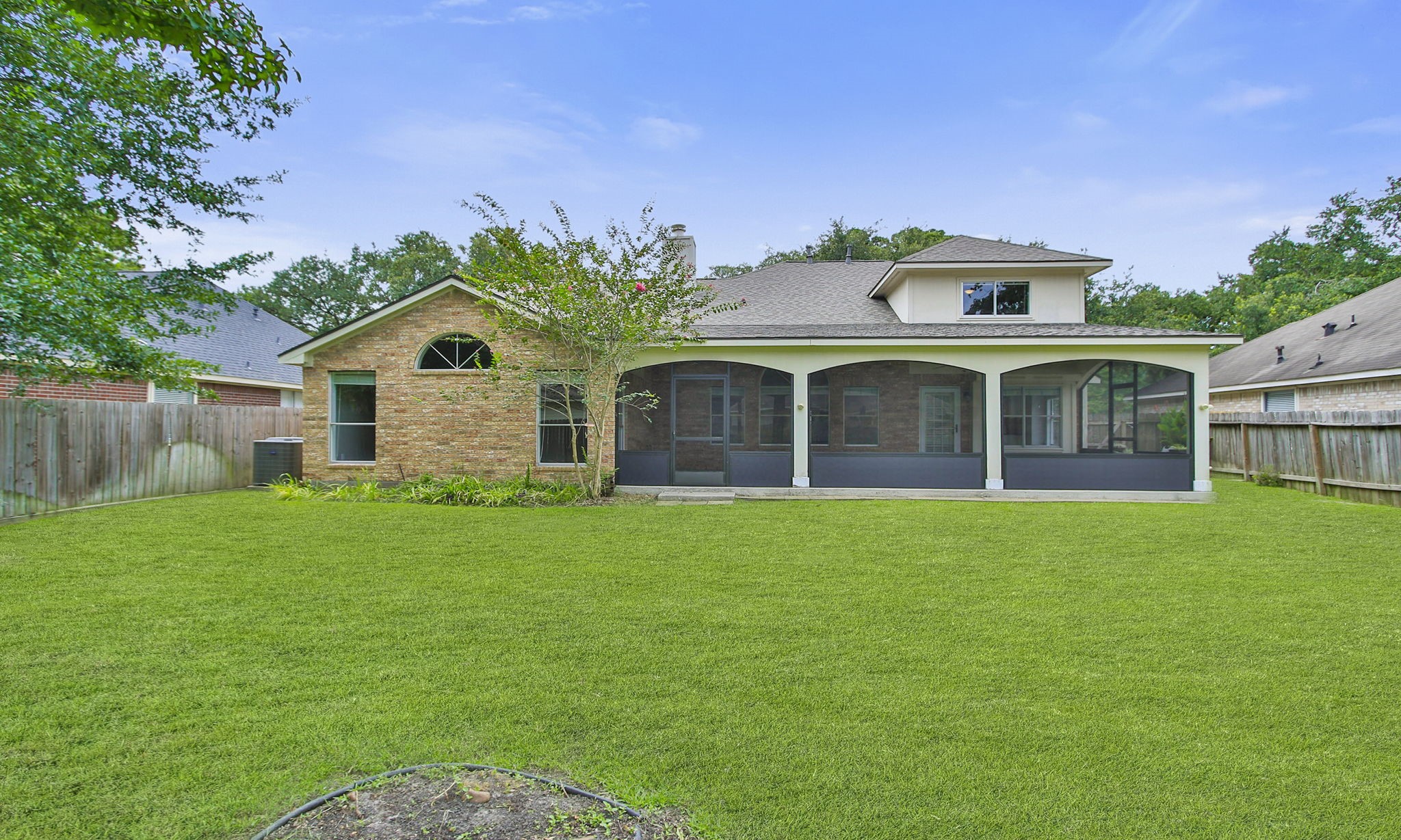 1915 West Welsford Drive Spring, TX 77386 - Photo 46 of 48 a front view of a house with a garden