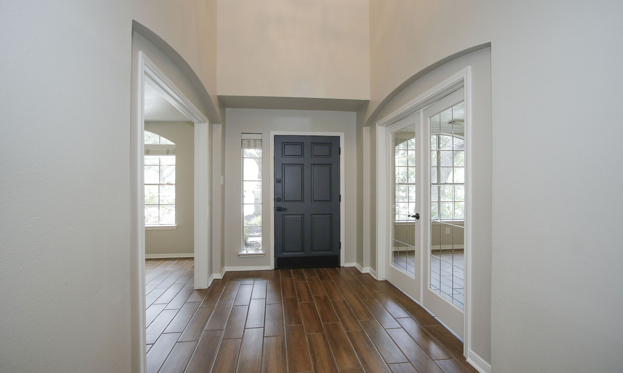 1915 West Welsford Drive Spring, TX 77386 - Photo 5 of 48 a view of hallway with bathroom and wooden floor