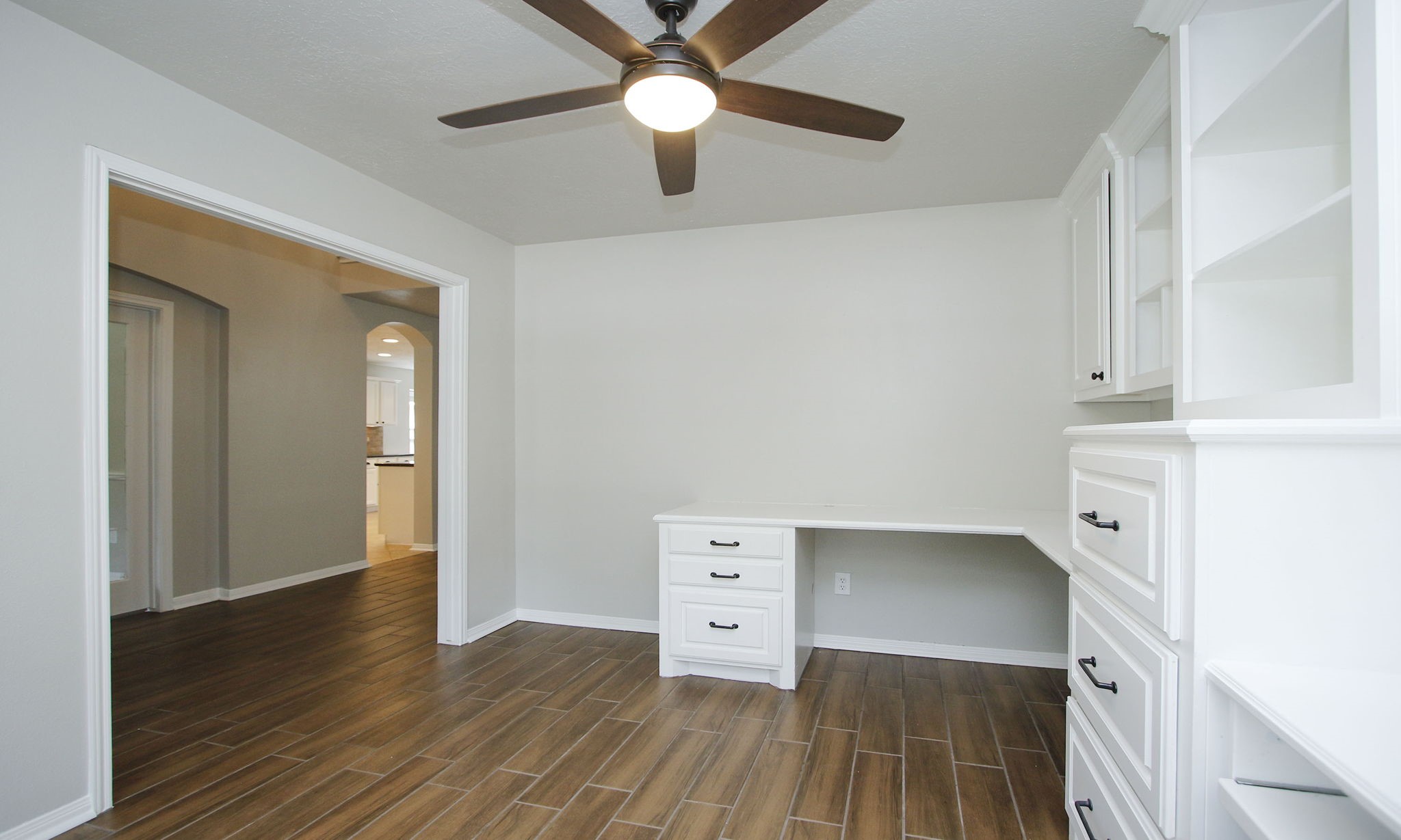 1915 West Welsford Drive Spring, TX 77386 - Photo 9 of 48 a view of a hallway with wooden floor