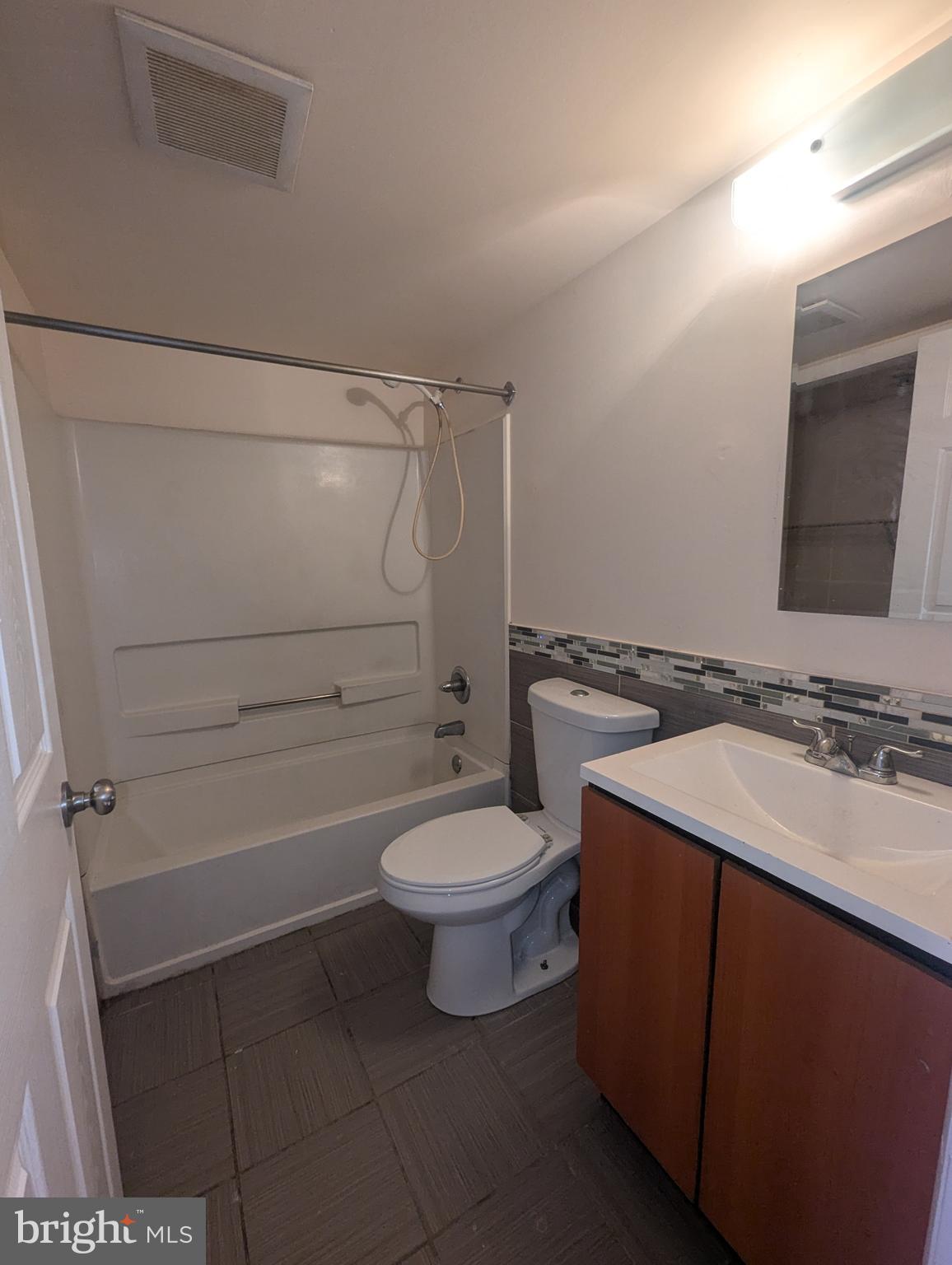 1624 West Diamond Street Philadelphia, PA 19121 - Photo 14 of 38 a bathroom with a sink a toilet and shower