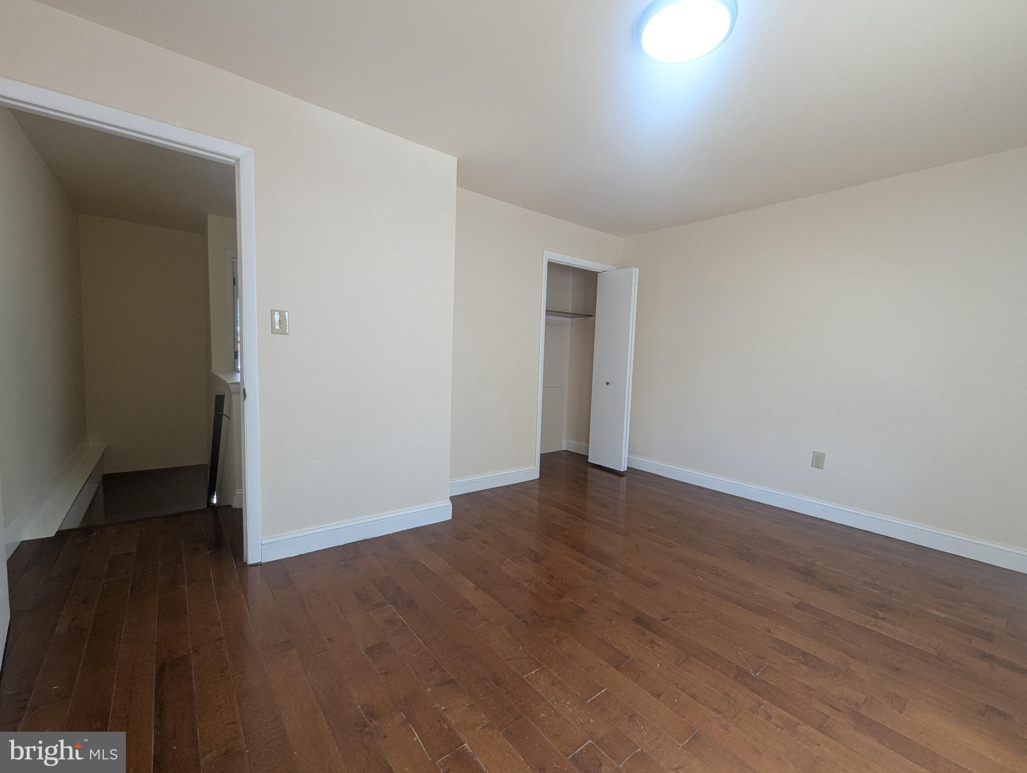 1624 West Diamond Street Philadelphia, PA 19121 - Photo 23 of 38 a view of an empty room with wooden floor