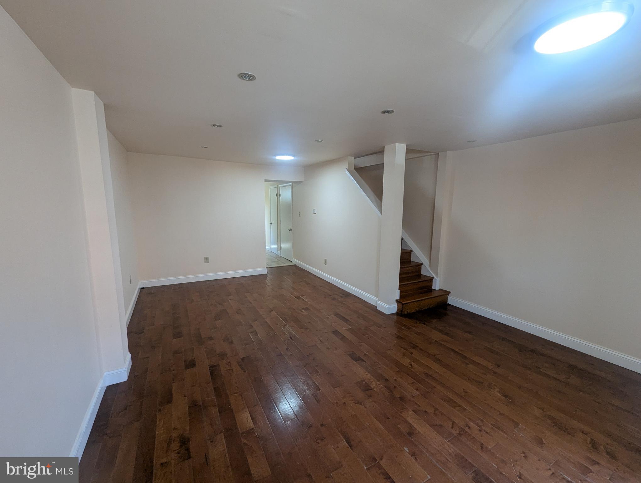 1624 West Diamond Street Philadelphia, PA 19121 - Photo 3 of 38 a view of an empty room with wooden floor