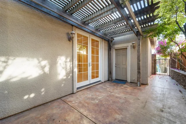 a view of a porch with a large tree