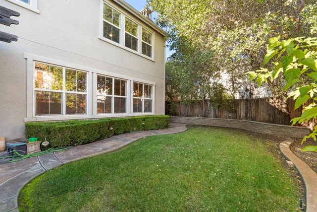 a house view with a garden space