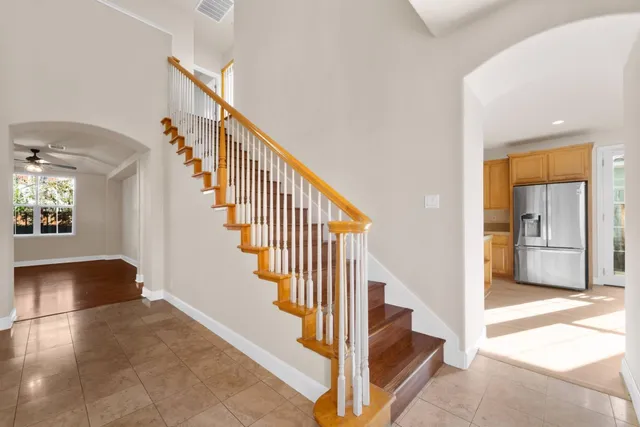 a view of a hallway view with staircase