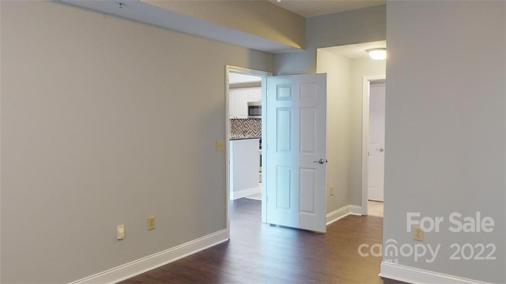 300 West 5th Street, Unit 339 Charlotte, NC 28202 - Photo 15 of 40 wooden floor in an empty room