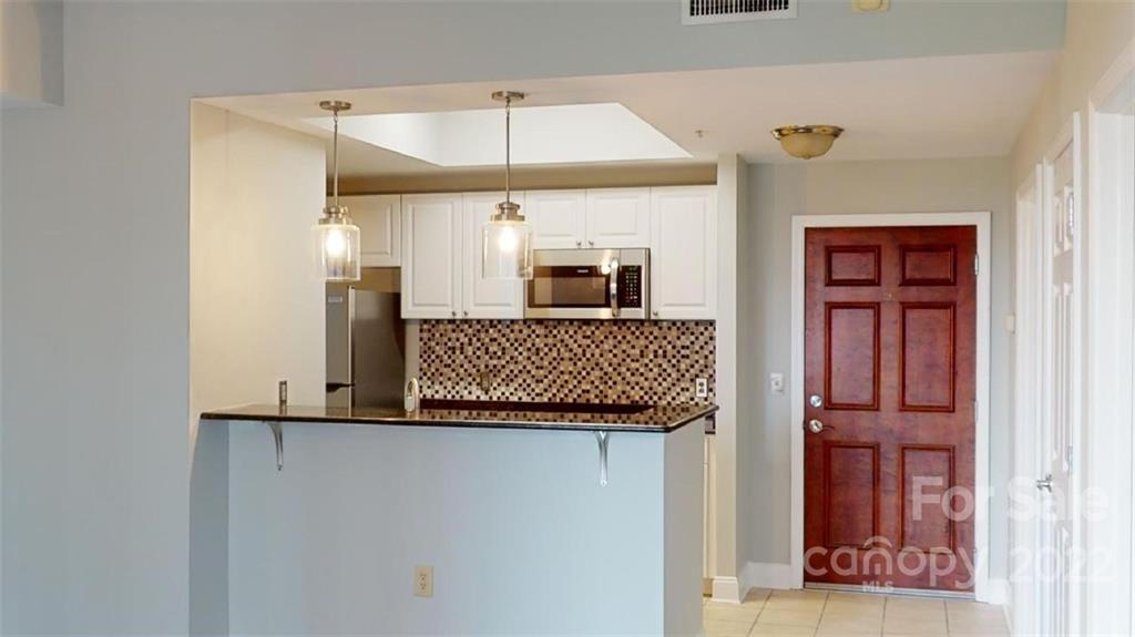 300 West 5th Street, Unit 339 Charlotte, NC 28202 - Photo 18 of 40 a view of a hallway with entryway